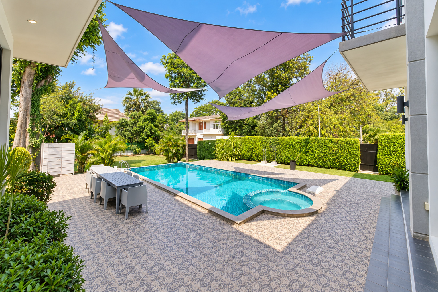 Private swimming pool with jacuzzi and shade sails – villa for rent Vientiane