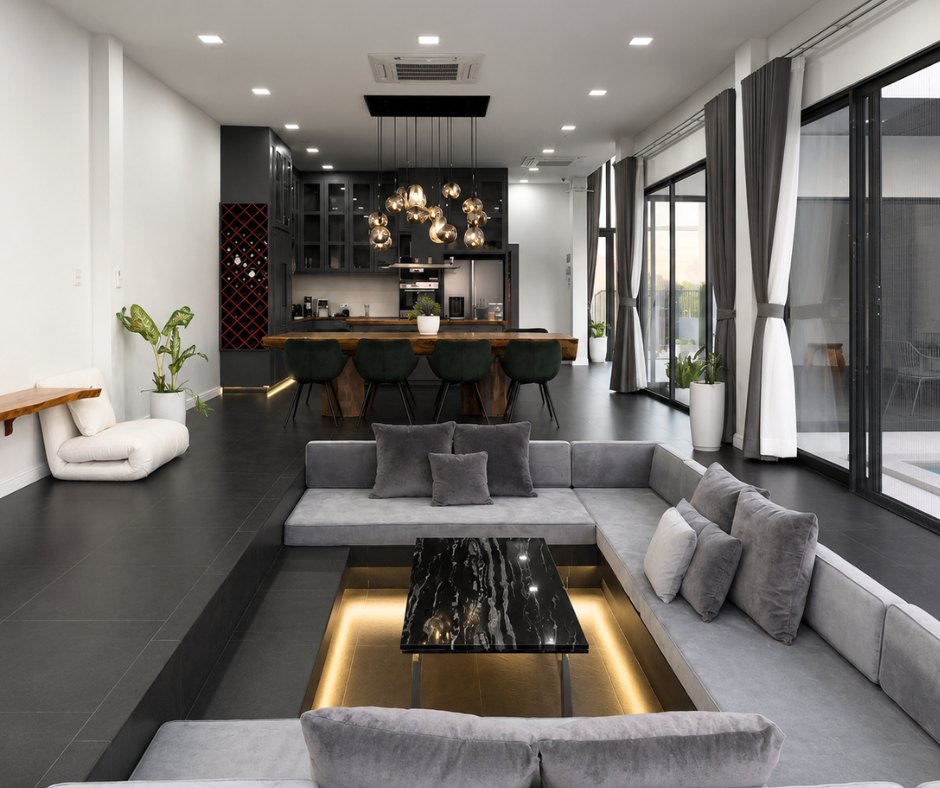 villa khamsavath vientiane living dining area Open-plan living and dining area with sunken lounge in a Vientiane rental villa