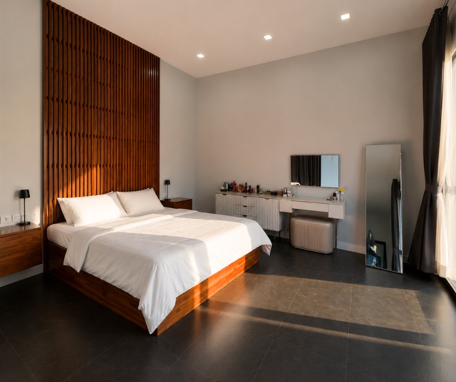 villa khamsavath vientiane master bedroom Master bedroom with wooden slat headboard in a 3-bedroom villa in Vientiane