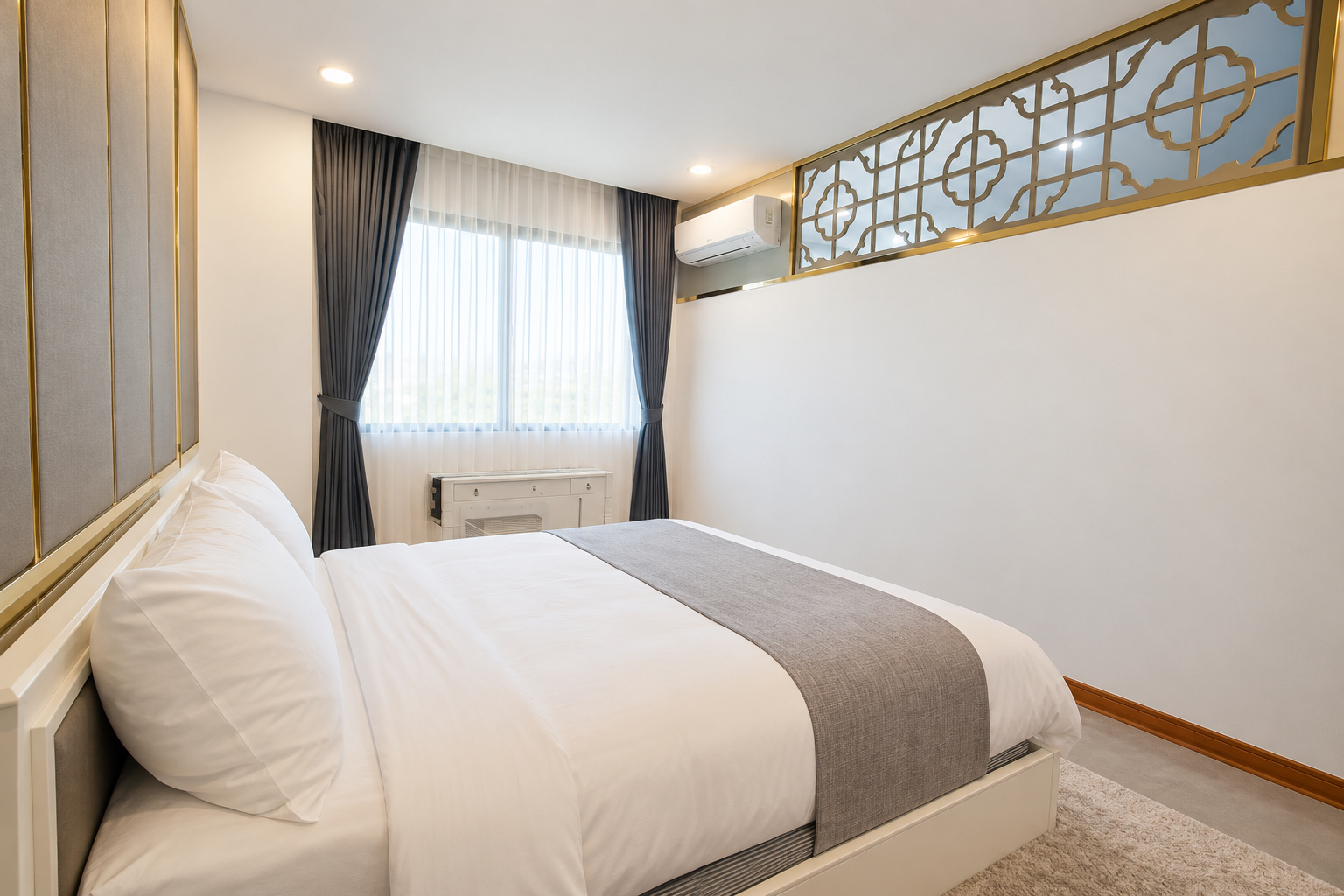 Second bedroom with decorative gold screen – large apartment 2 bedrooms with pool and gym, Sisattanak expat area, Vientiane