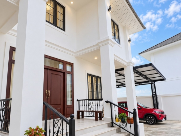 Modern white villa facade with covered parking – modern villa, Sisattanak expat area, Vientiane