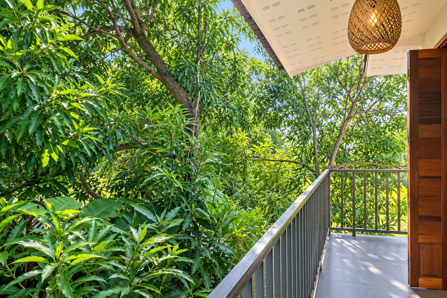 New 1 bedroom apartment for rent near Wattay Airport Vientiane – Balcony overlooking the trees of the garden park
