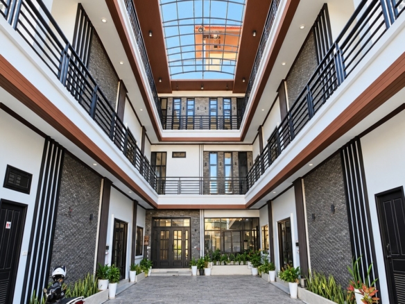Modern residence courtyard with skylight – new apartment near Patuxai, Vientiane