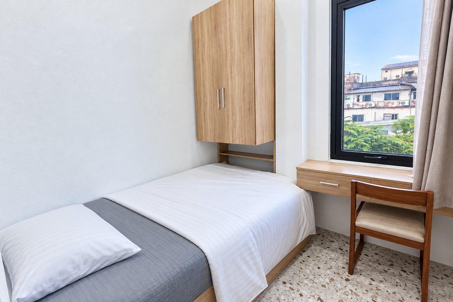 Second bedroom with single bed and desk – new apartment, city center, Vientiane