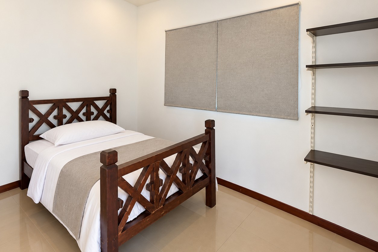 Bedroom with wooden bed and shelves – new 4-bedroom villa near ITECC Mall, Vientiane