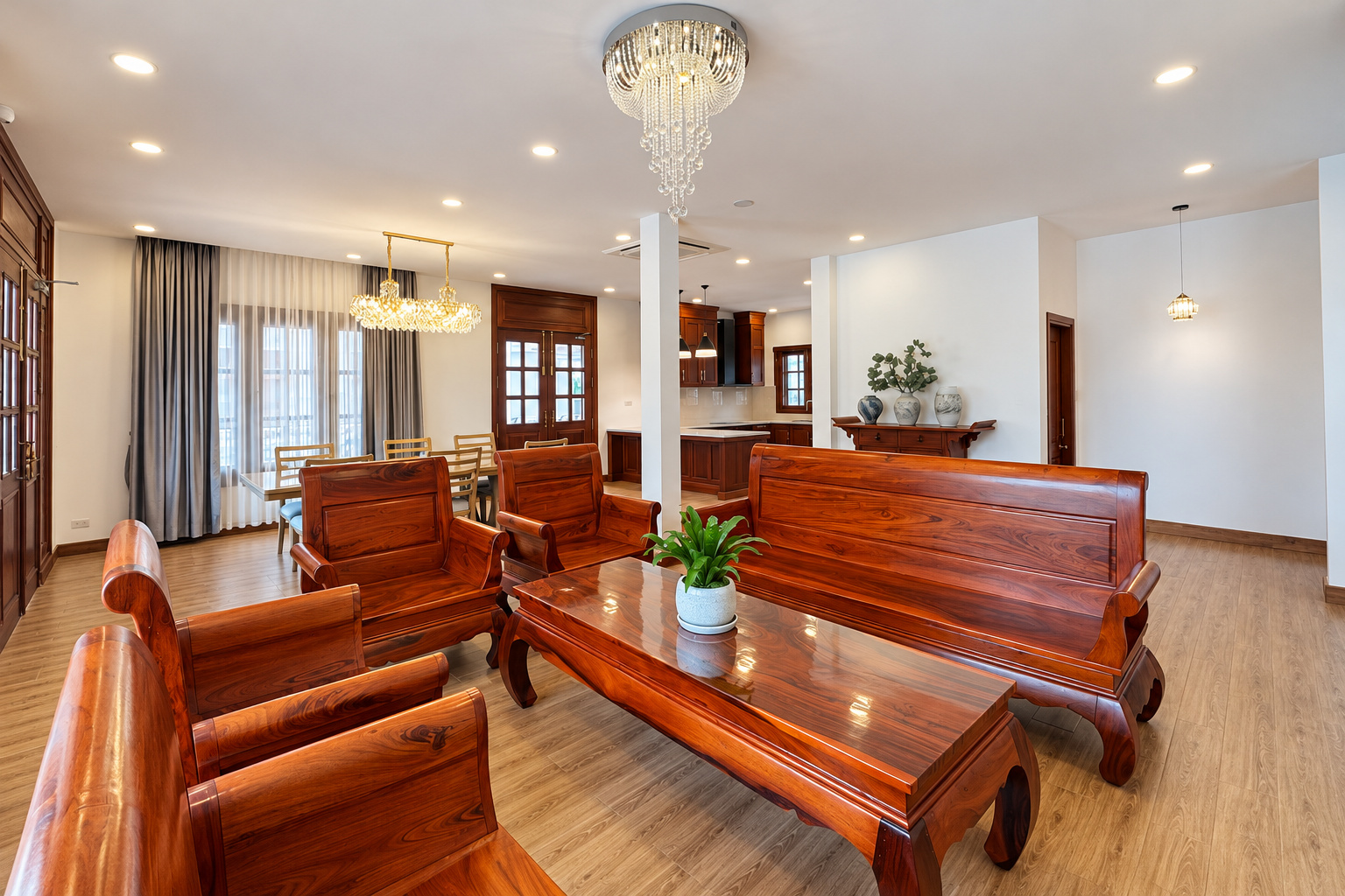 Living room with solid wood furniture and crystal chandelier – new villa, Xaysettha, Vientiane