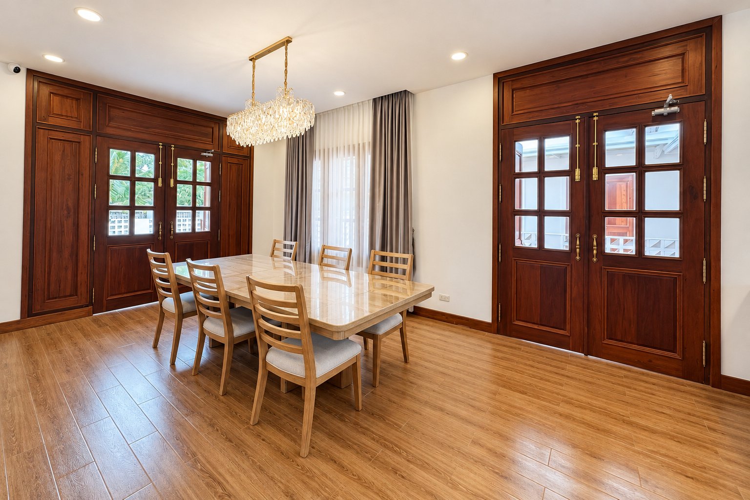 Dining room with tall wooden French doors – new villa, Xaysettha, Vientiane