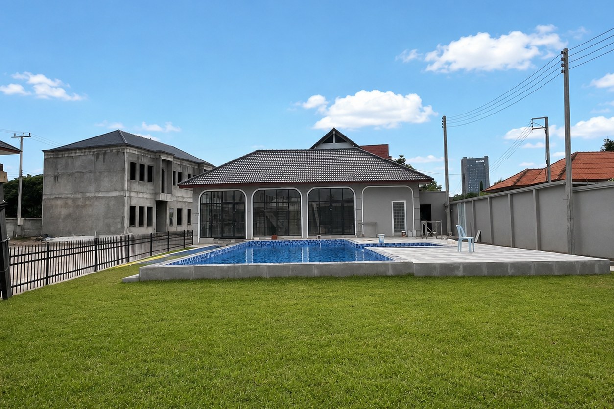 Clubhouse, lawn and shared swimming pool Clubhouse, lawn and shared swimming pool – villa 3 bedrooms with shared pool, Sisattanak expat area, Vientiane