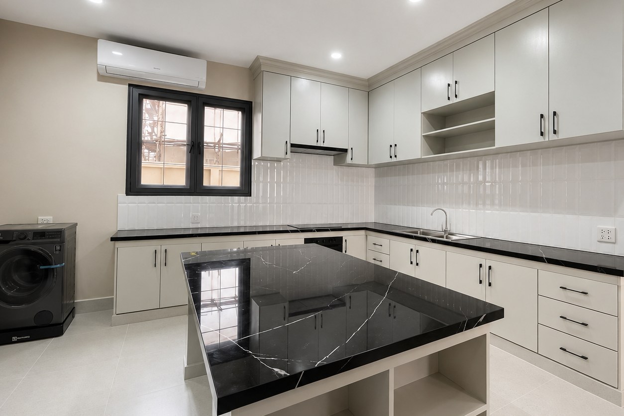 Kitchen with marble island and washing machine Kitchen with marble island and washing machine – villa 3 bedrooms with shared pool, Sisattanak expat area, Vientiane